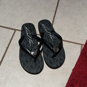 Athentic Michael Kors flip flops size 10
